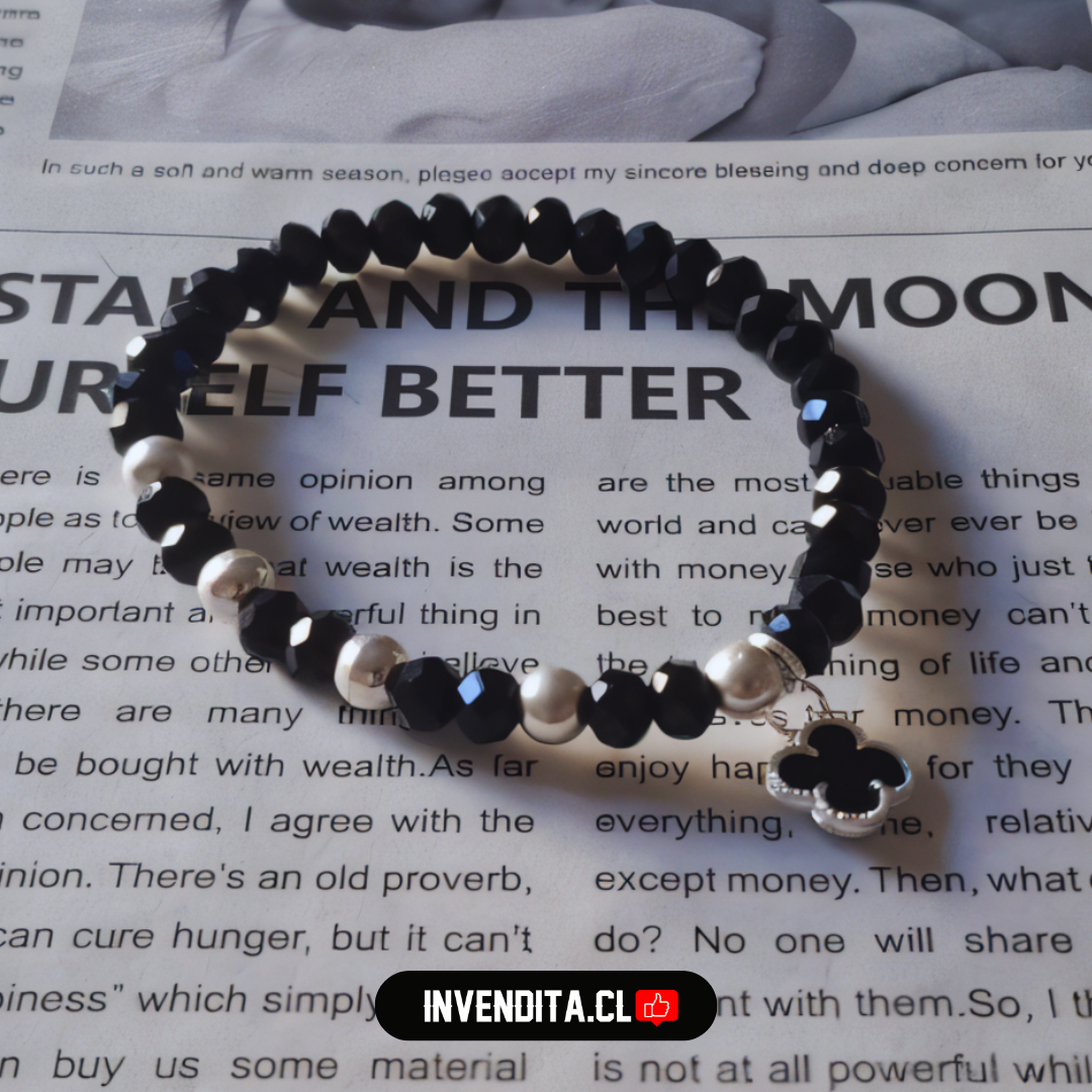 Pulsera enchapada en plata cristales negros con dije de flor