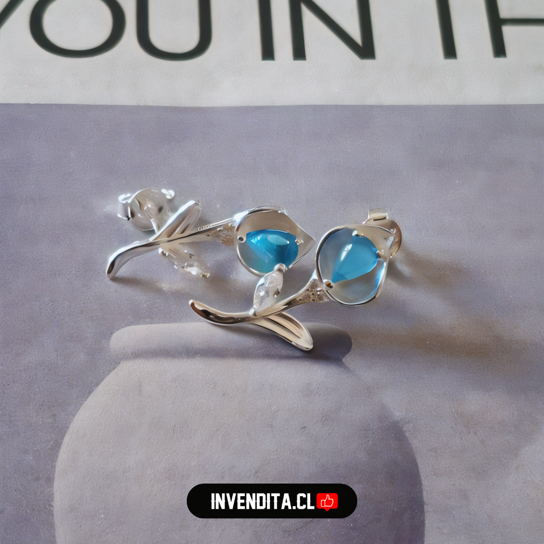 Aros de plata 925 flor con circones y cristal celeste