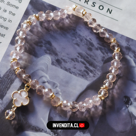 Pulsera enchapada en oro terminales dorados con cristales rosas y dije de flor