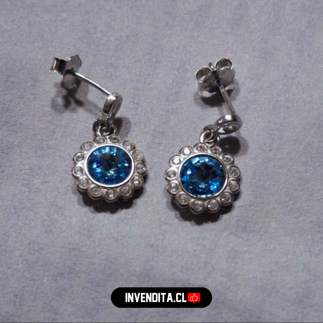 Aros de plata 925 diseño flor con cristal celeste Swarovski Elements