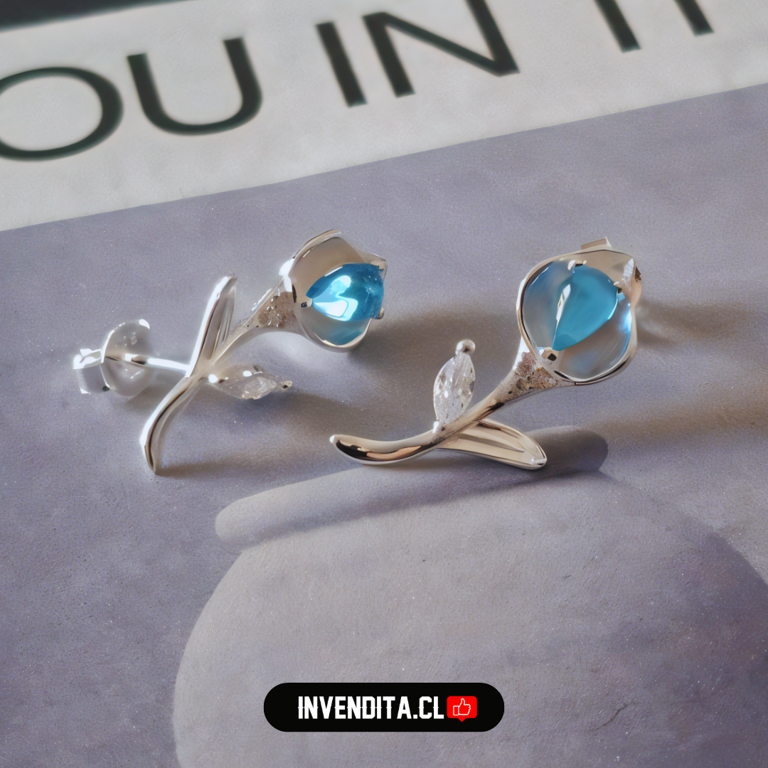 Aros de plata 925 flor con circones y cristal celeste