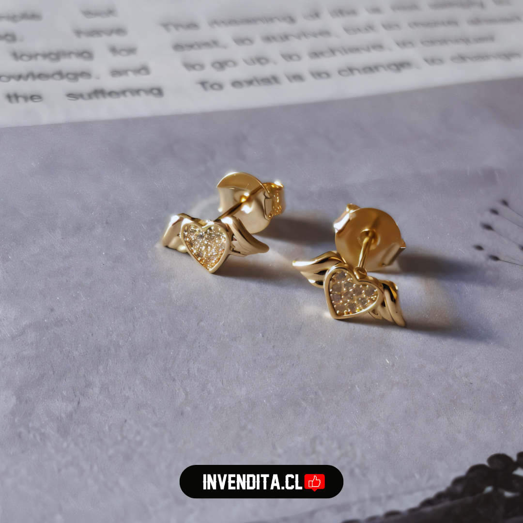 Aros enchapados en oro diseño corazón alado con circones