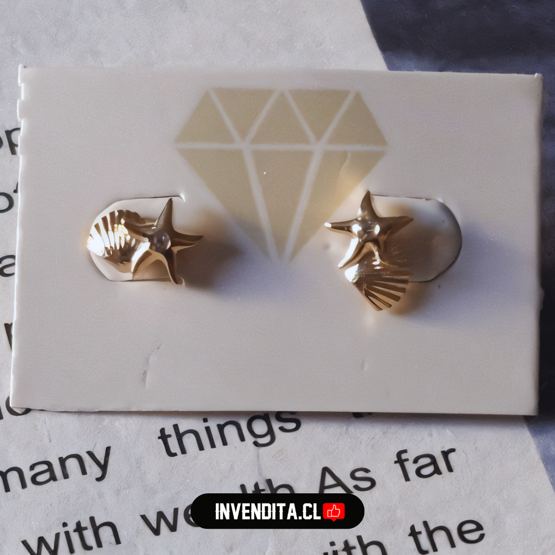 Aros enchapados en oro para niños con tope diseño estrellita y concha