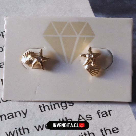 Aros enchapados en oro para niños con tope diseño estrellita y concha