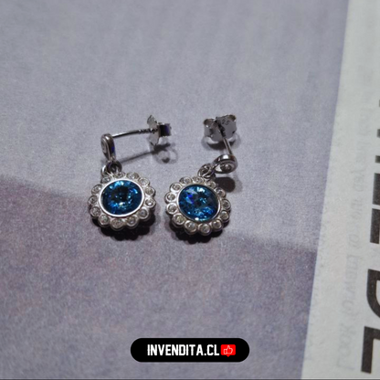 Aros de plata 925 diseño flor con cristal celeste Swarovski Elements