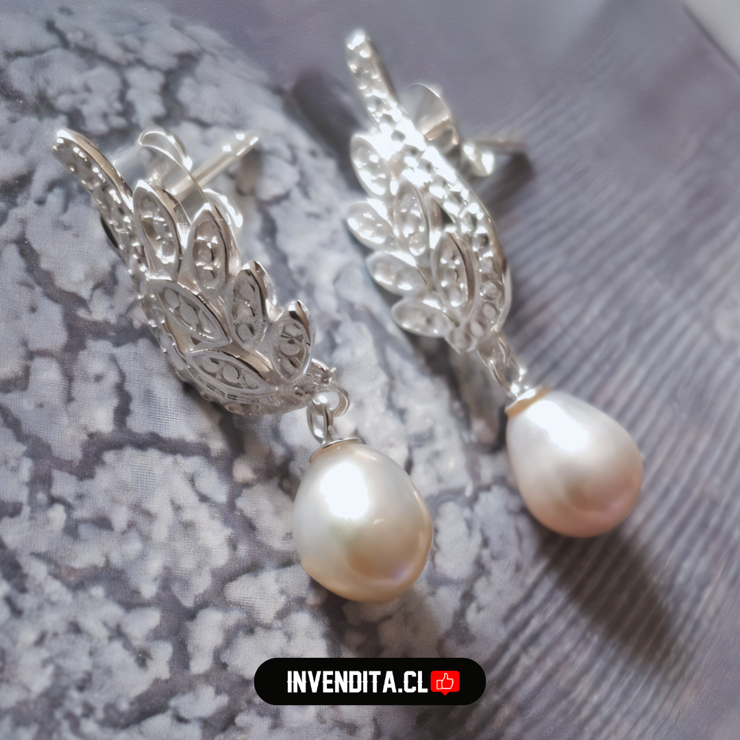 Aros de plata 925 pluma con perlas de río