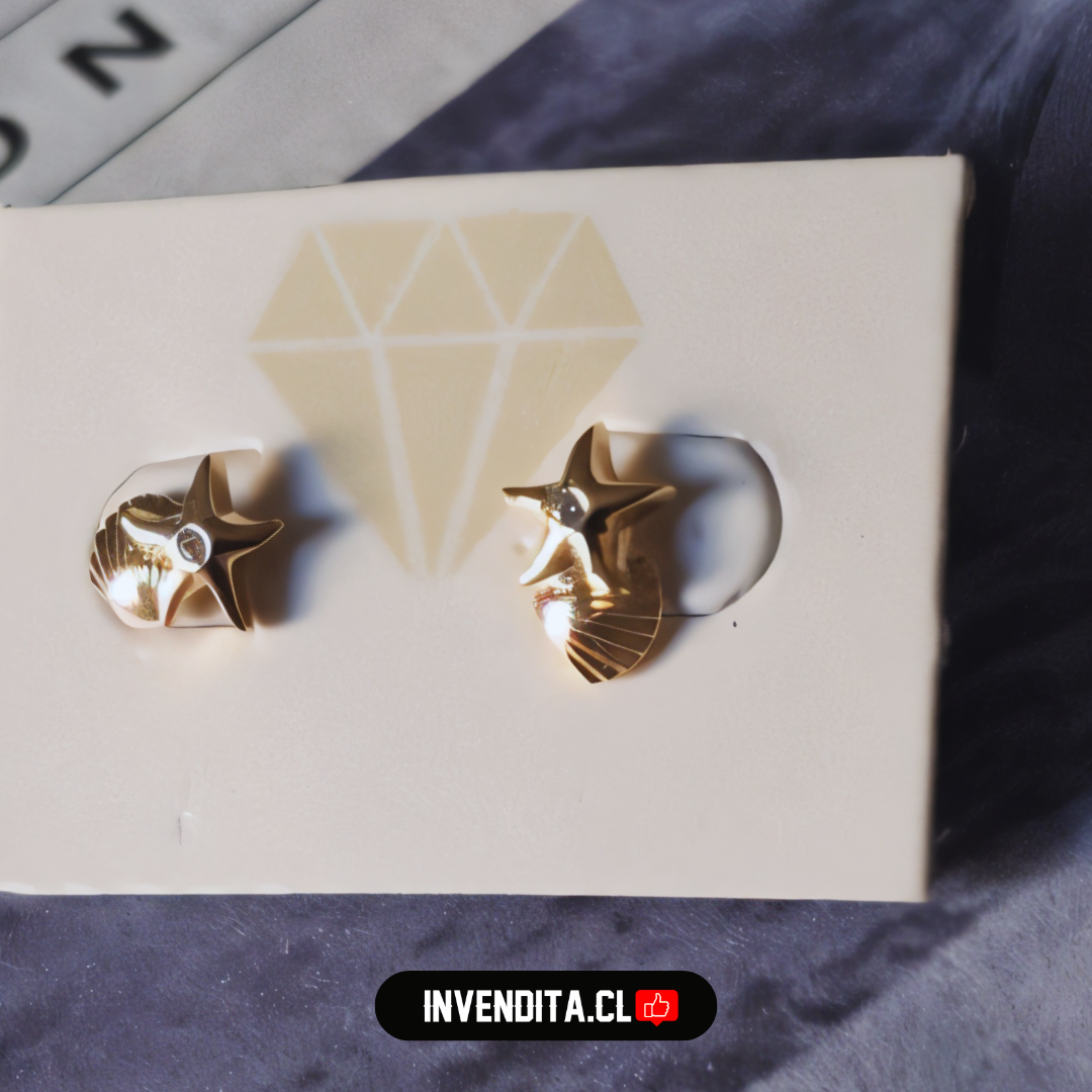 Aros enchapados en oro para niños con tope diseño estrellita y concha