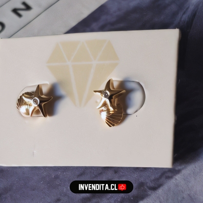 Aros enchapados en oro para niños con tope diseño estrellita y concha