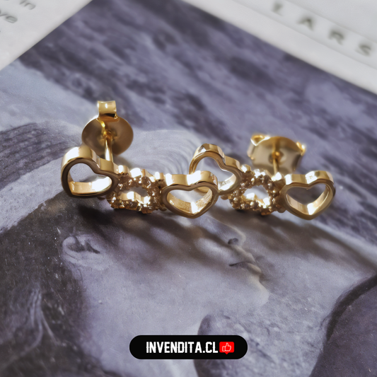 Aros enchapados en oro tres corazones con circones