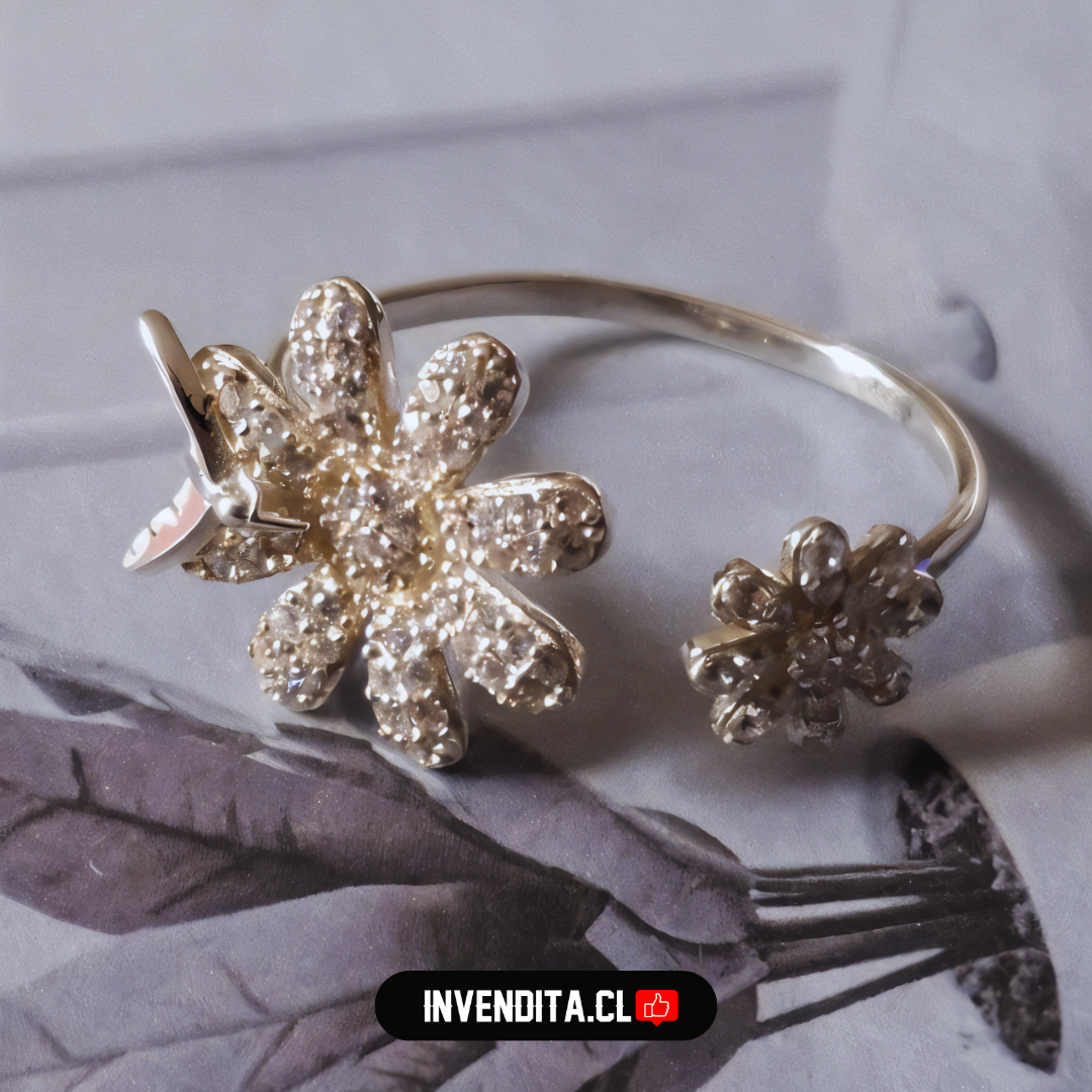 Anillo de plata 925 margarita de circones con golondrina