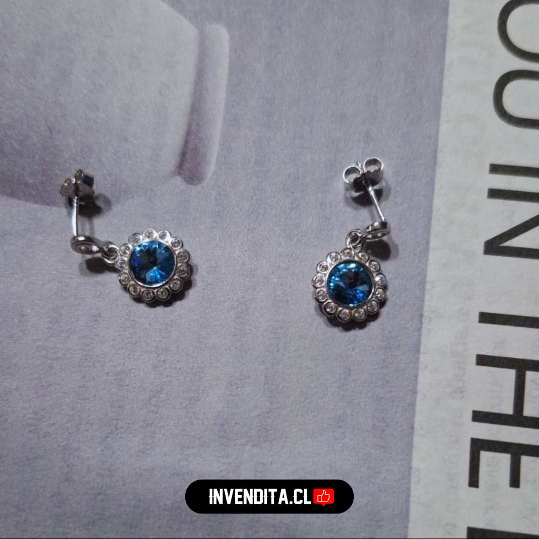 Aros de plata 925 diseño flor con cristal celeste Swarovski Elements