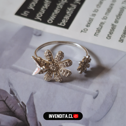 Anillo de plata 925 margarita de circones con golondrina