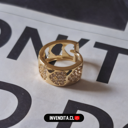 Aros enchapados en oro argolla con circones y corazones