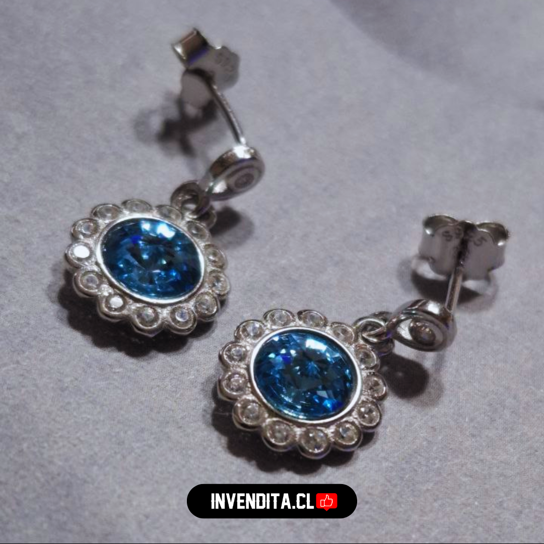 Aros de plata 925 diseño flor con cristal celeste Swarovski Elements